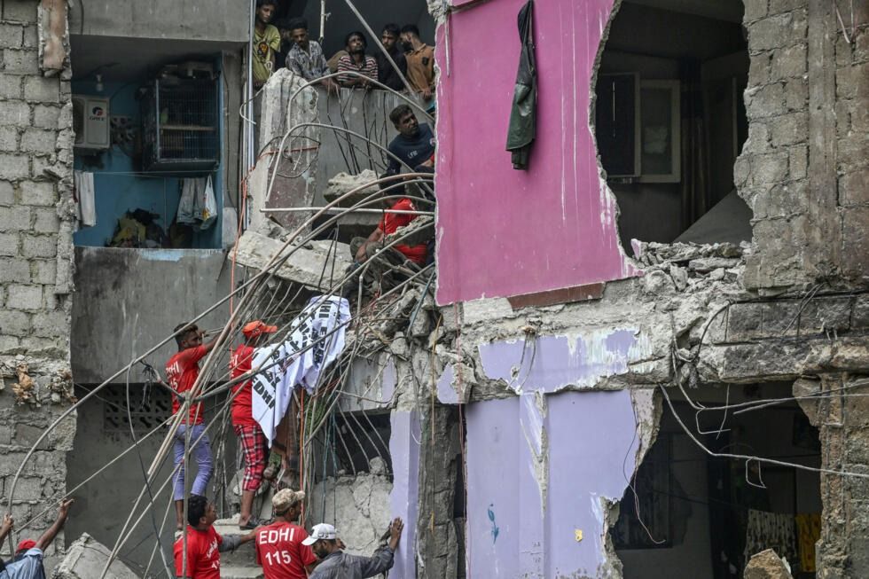 Rescue teams worked through the day and night to clear the rubble and find survivors. - Photo: AFP