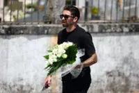 Carrying red wreath, Liverpool players join family for Diogo Jota's funeral