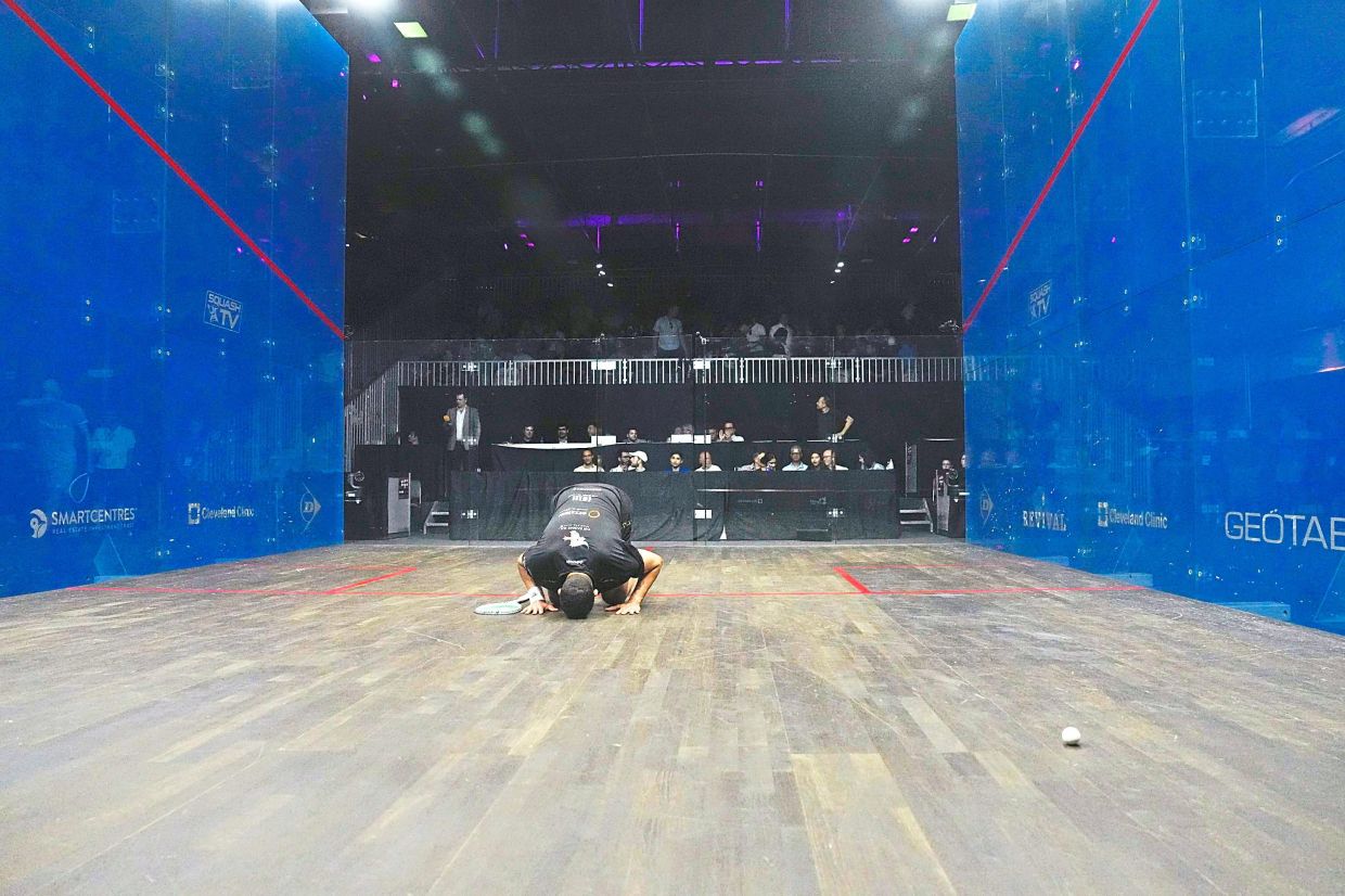 Mostafa celebrates after defeating England’s Marwan El Shorbagy at the PSA Squash Tour Final in Toronto on June 23. — AP