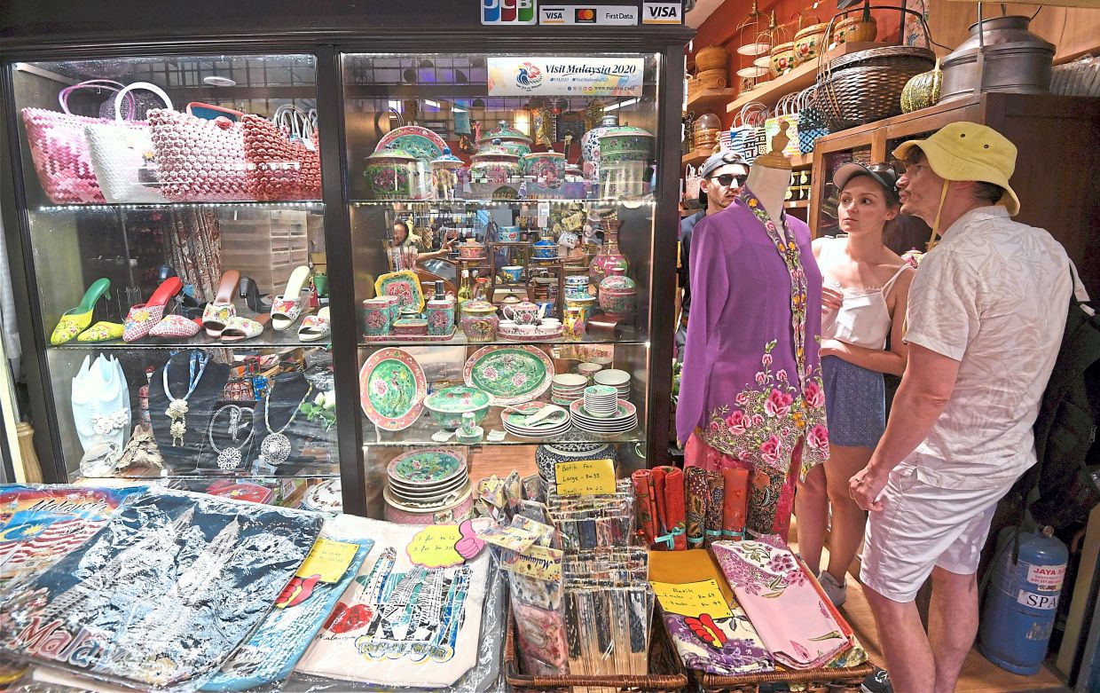 A wide array of Peranakan cultural items beckon at a shop in Pasar Seni.