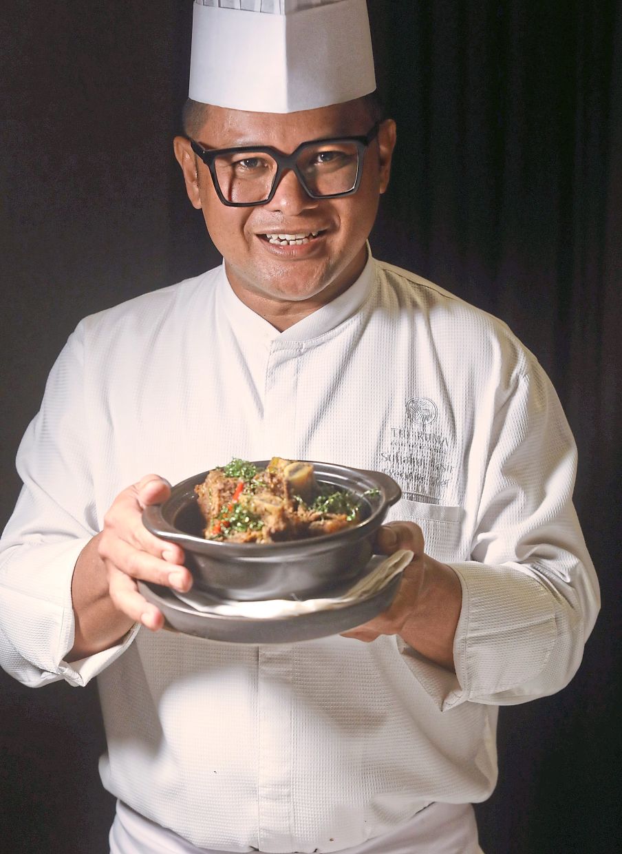  Suhalmi with his signature Beef Rib Rendang Tok using Angus short ribs. — Photos: AZLINA ABDULLAH/The Star