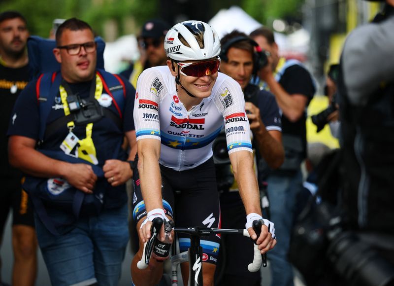 Cycling-Belgium's Merlier edges Milan in photo finish after crash-marred stage