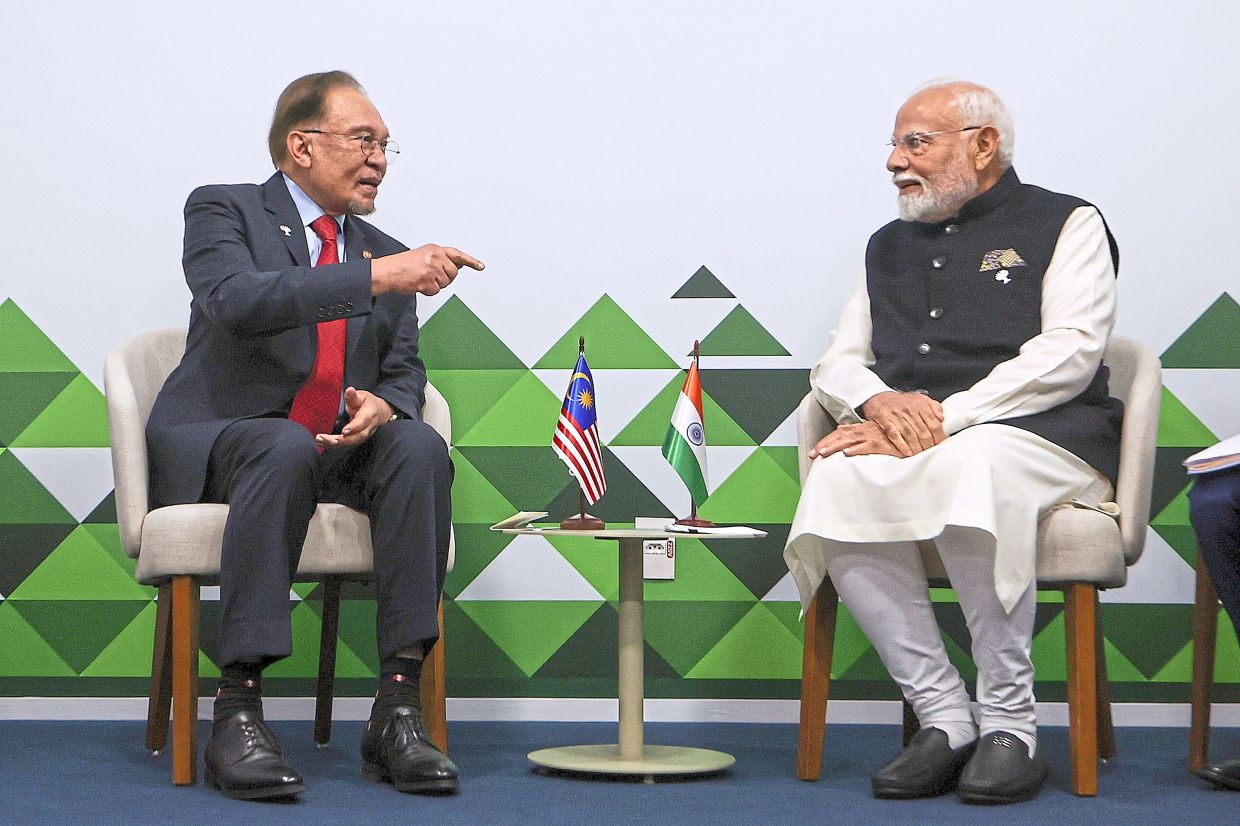 Deepening ties: Anwar having a meeting with Modi in Rio de Janeiro. — Bernama
