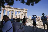 Greece shuts Acropolis for part of day as heat soars, bans outdoor work