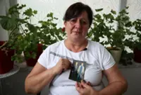 Wife buries remains of Srebrenica victim 30 years after Bosnia genocide