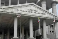 Parking attendant charged with possessing fake pistol, threatening others