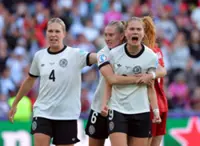 Soccer-Germany surf wave of travelling support to book Euro 2025 knockout spot