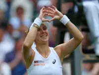 Tennis-Swiss mum Bencic through to her first Wimbledon semi-final