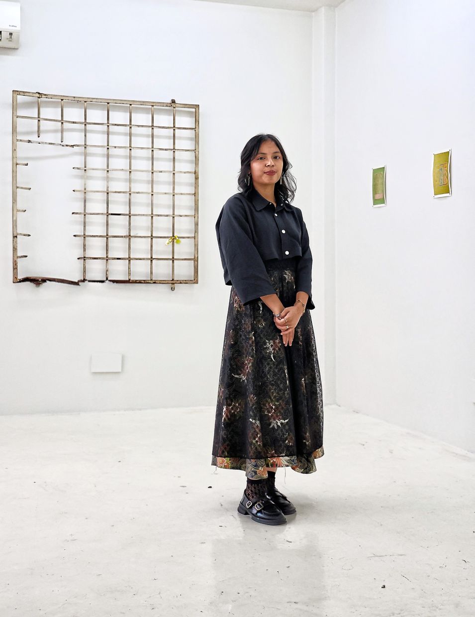 Upon returning to Malaysia after finishing her studies, Ain began to notice the prevalence of grilles and gates in Malaysian homes.