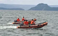 Search for missing cockfighters begins at Philippine lake