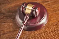 Woman charged with cheating and forgery over BND25,000 scam in Brunei