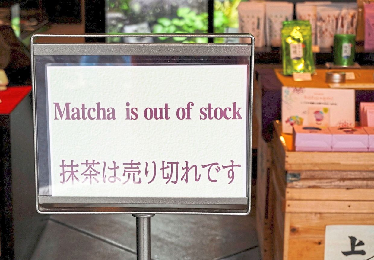 Much ado over matcha: A signboard reading ‘Matcha is out of stock’ is displayed in front of a tea store in Uji, Kyoto prefecture. — Reuters