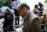 US singer Chris Brown pleads not guilty to lesser assault charge in UK court