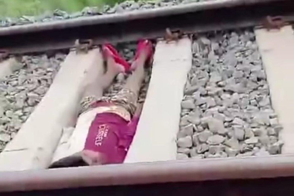 Boy in India detained after lying on tracks as train speeds by for ...