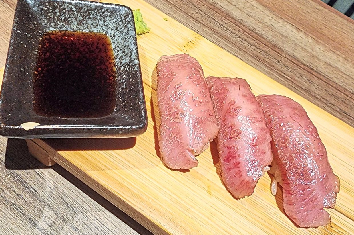 Indulge in the seared wagyu sushi. — ABIRAMI DURAI/The Star
