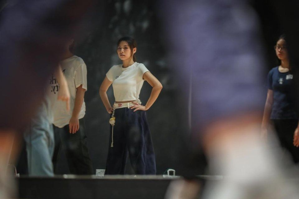 Qti Tan (in white cropped top), who taught herself K-pop choreography from YouTube videos, has always loved dancing and performing. -- ST PHOTO: TARYN NG