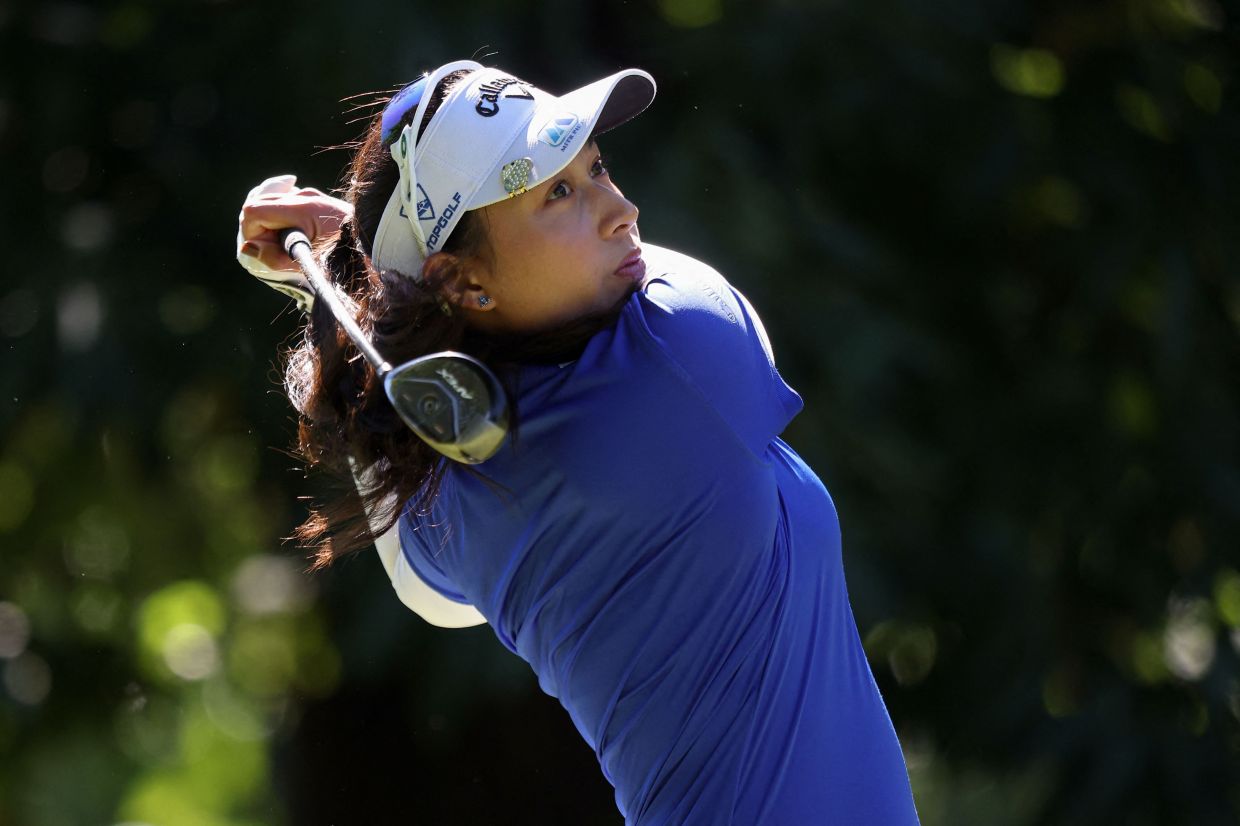 Thailand's Jeeno Thitikul looks on after a shot during the third round of the Amundi Evian Championship at Evian Resort Golf Club, in Evian-Les-Bains, eastern France, on Saturday, July 12, 2025. -- Photo by Alex MARTIN / AFP