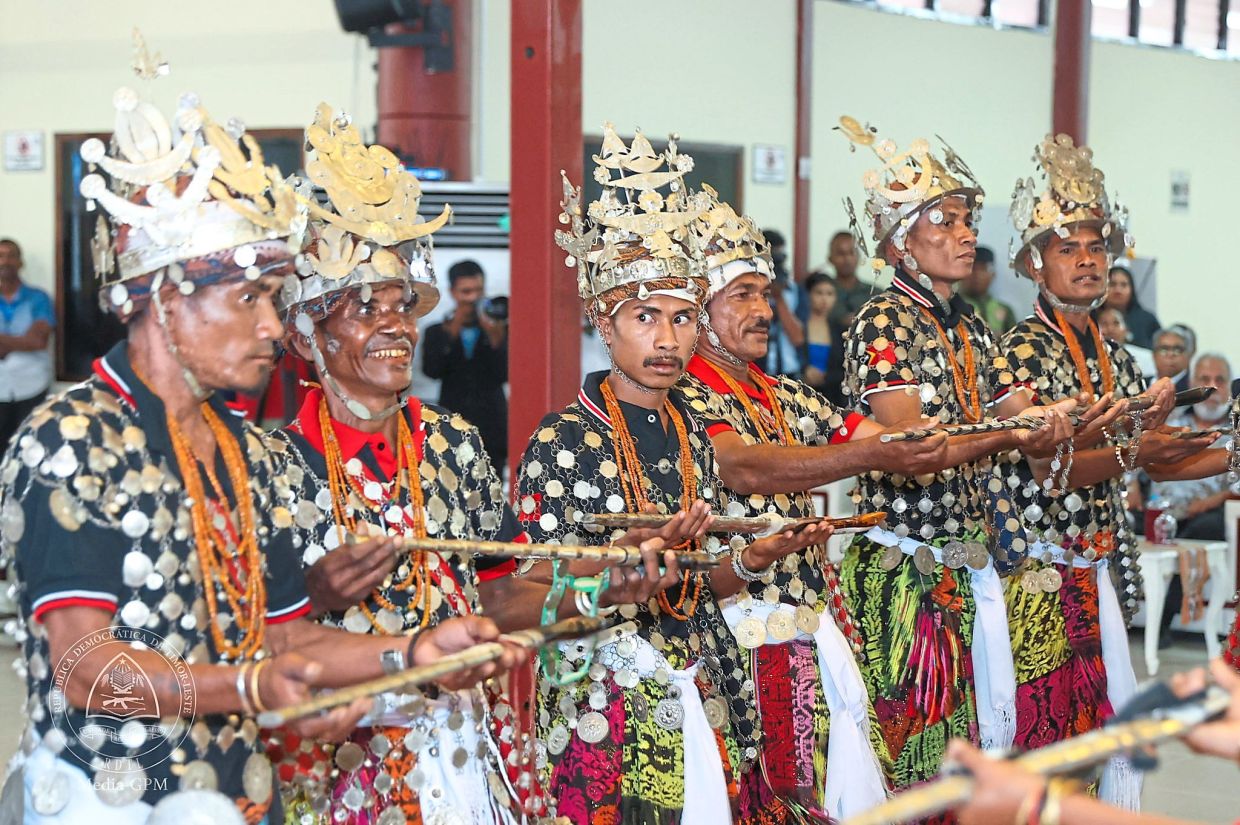 Traditional sword dancers from Timor fuse ancestral warrior rites and rhythmic chants into living expressions of the island’s enduring spirit. Photo: Primero Ministerio Office, TL