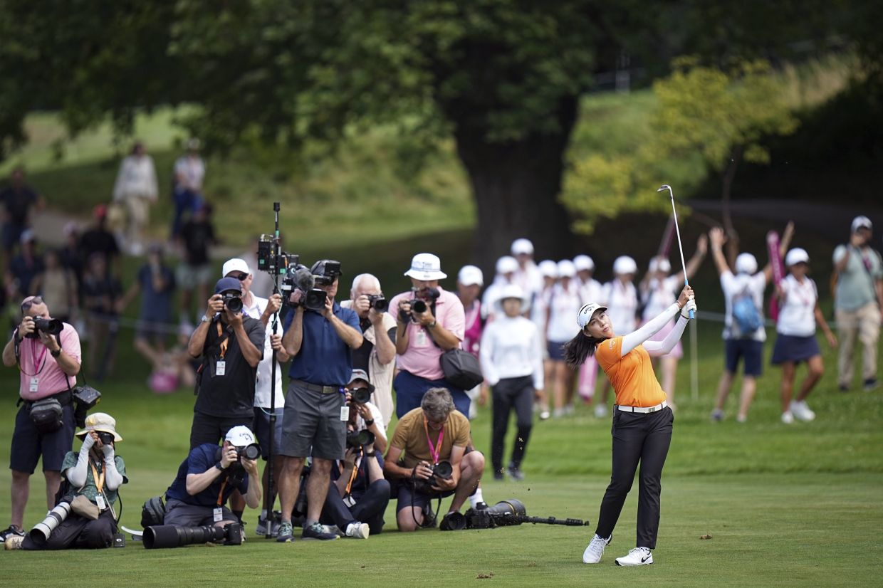 Jeeno Thitikul, of Thailand, plays on the 18th hole during the last round of the Evian Championship women's golf tournament, in Evian, eastern France, Sunday, July 13, 2025. -- AP Photo/Laurent Cipriani