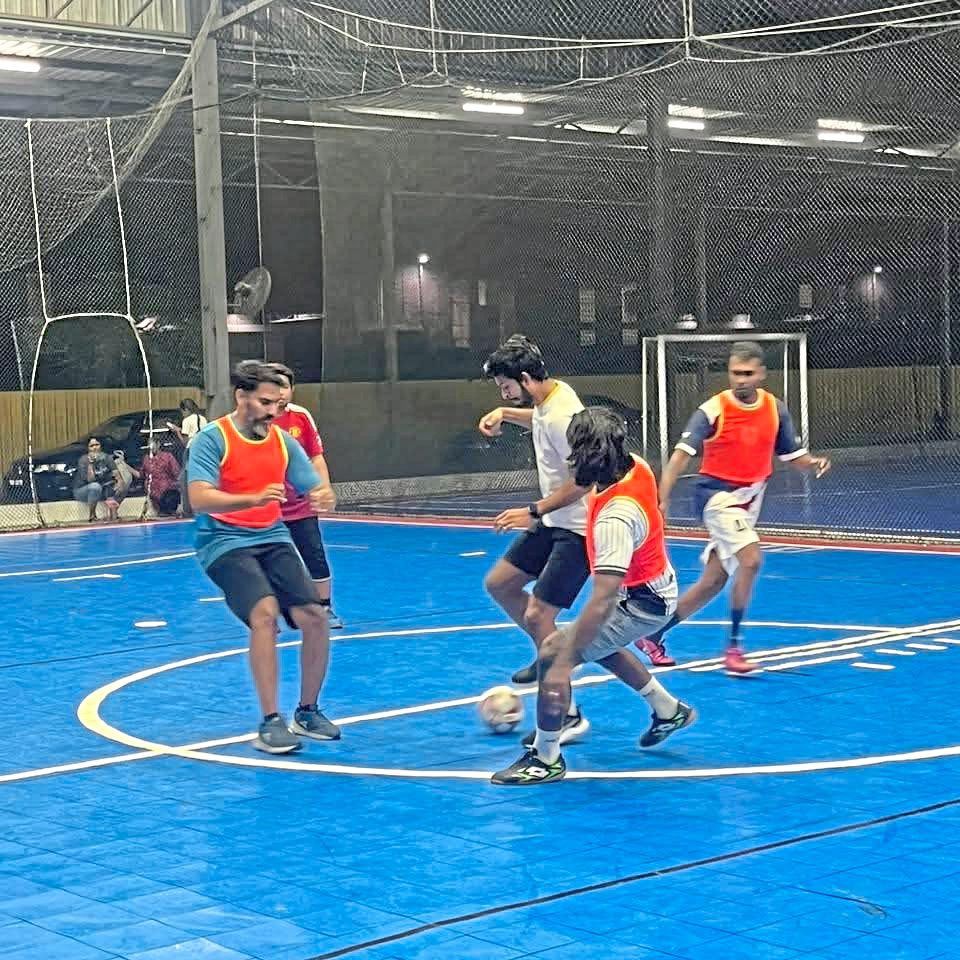 Having a ball: Reuben joins the players for a game.