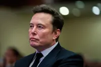Musk suggests Tesla investor vote on xAI investment, rules out merger