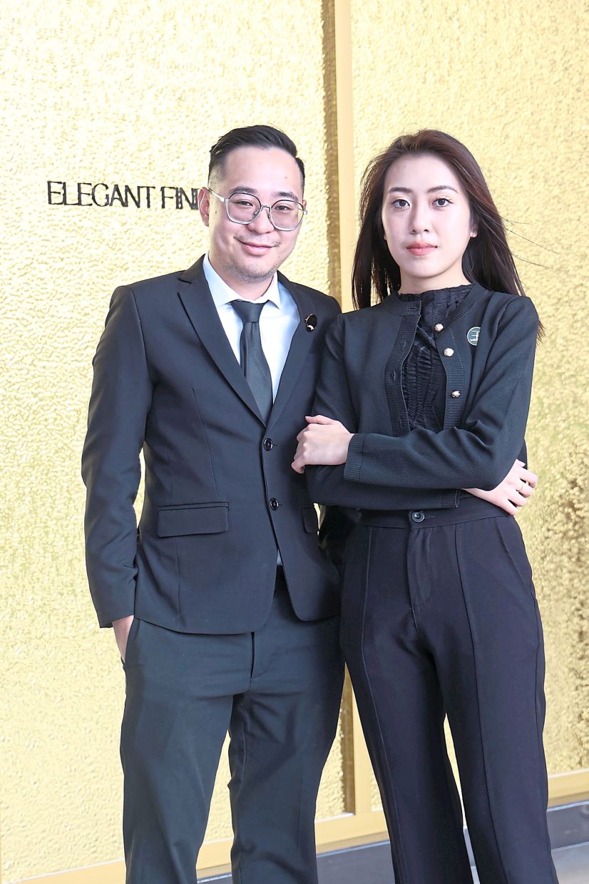 Tong (left) and Yan are the couple behind Elegant Fine Caviar, a Malaysian caviar brand that is cultivated on a farm in China. — ART CHEN/The Star