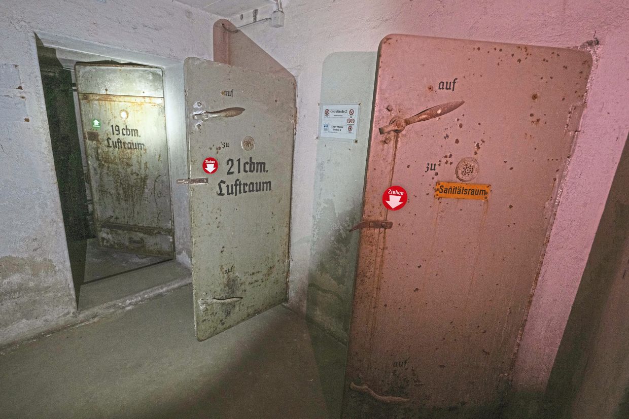Squeaky iron doors located 12m below an industrial plant near Frankfurt. — BORIS ROESSLER/dpa
