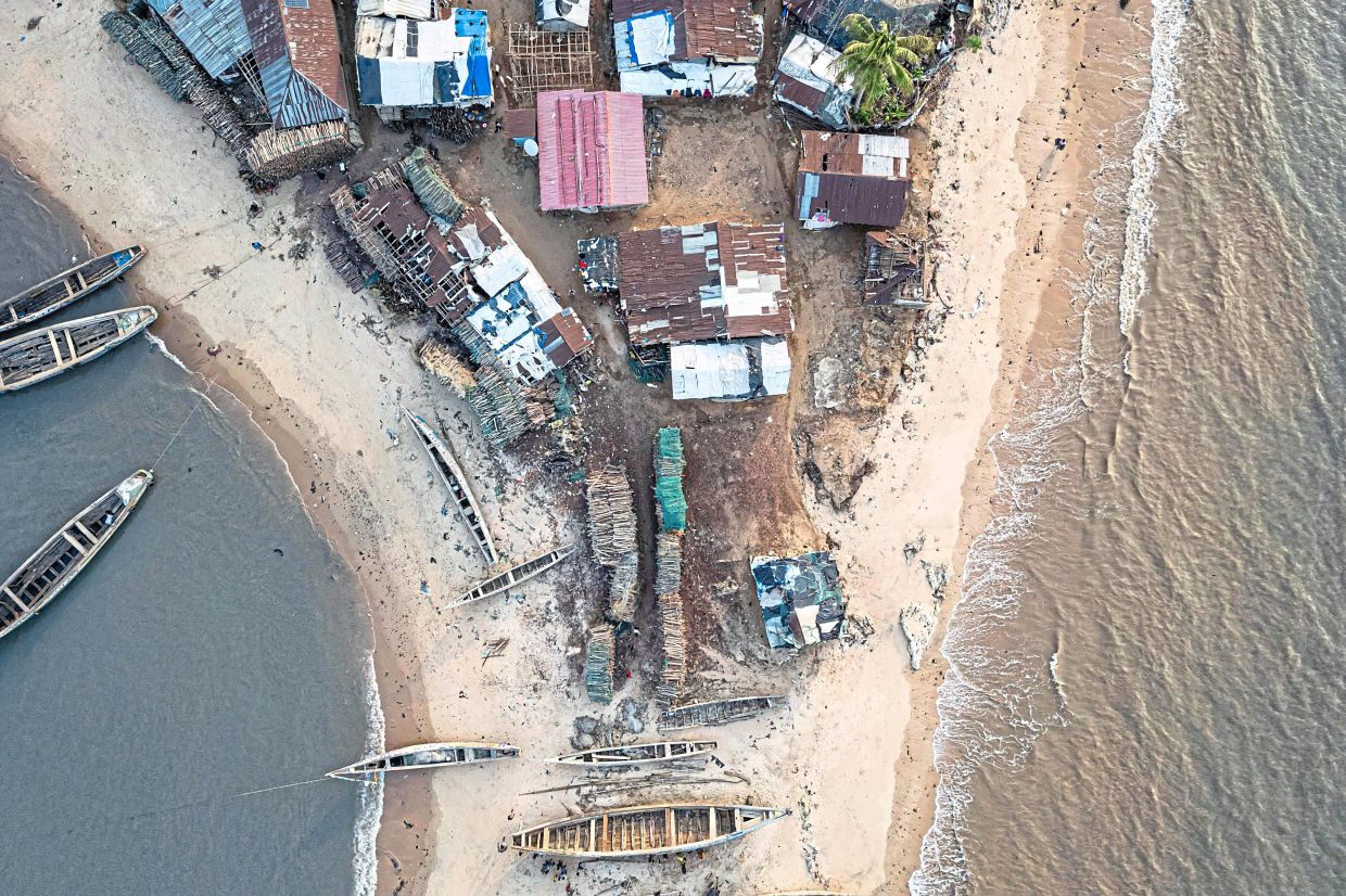 An aerial view of structures on Plantain Island, which had been adversely affected by climate change.