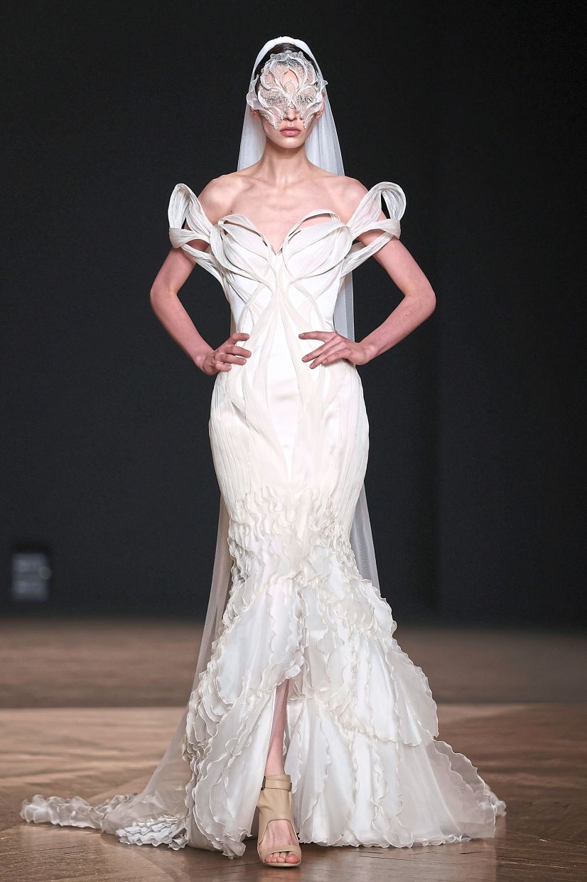 Wedding gowns crafted from lab-grown bio-protein, a futuristic Japanese fibre that’s biodegradable and endlessly recyclable is seen at Iris Van Herpen. Photo: AP