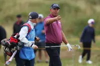 Golf-Harrington to hit first shot at Open before the McIlroy show