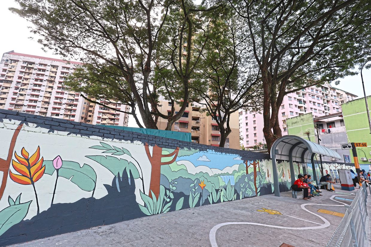 Murals painted along pedestrian walkways which have been spruced up to revitalise public spaces. — Photos: KAMARUL ARIFFIN/The Star