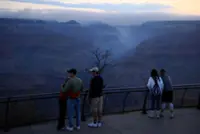 Grand Canyon fire that was left to burn swells 50% after destroying historic lodge