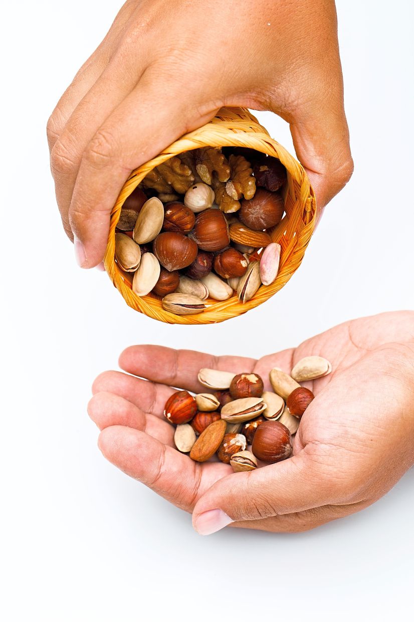 A handful of nuts is a good option for an afternoon snack at work.