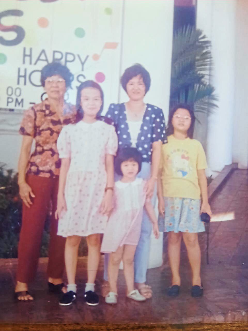 The writer (second from right) with her mother, Tiew Cho (first from left), and her three young daughters. — Photos: CHAN YEE AI