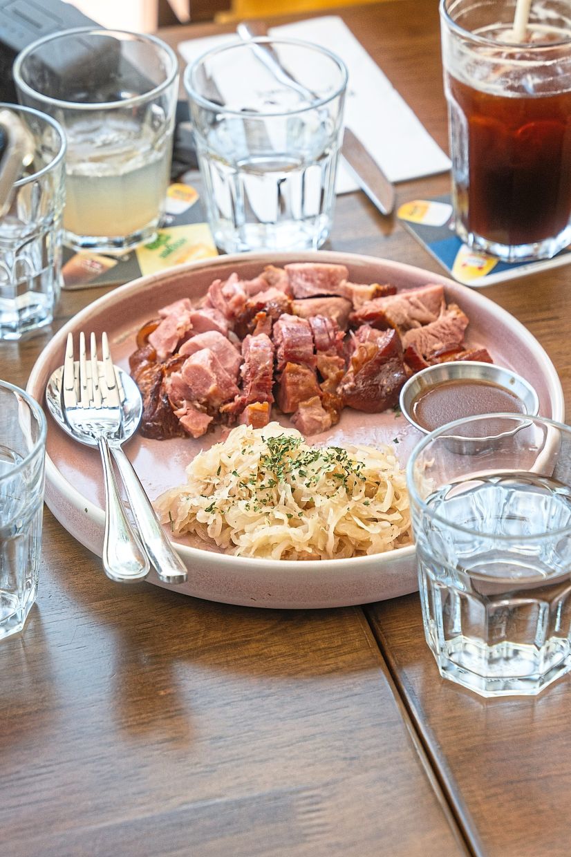 Smoked Pork Knuckle with Sauerkraut – one of the dishes available at The Butcher’s Table.