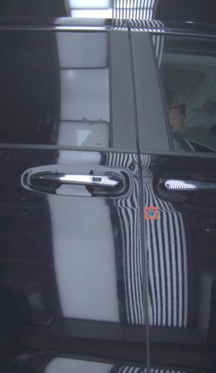 An image from a car scanner shows the passenger-side front door of a minivan, as she returned it in Atlanta, with a spot Hertz claimed was a dent highlighted in red. As Hertz rolls out AI-powered scanners that generate damage reports and fees, unexpected charges for damage barely visible to the naked eye are leaving some renters wondering what’s going on. — Kelly Rogers via The New York Times