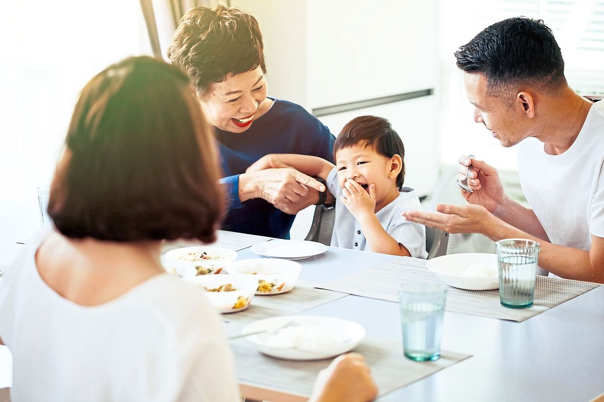 Children learn through observation and interaction, so parents should ensure they keep away their own devices and engage with their child during family time. — Filepic