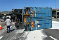 Chemical spill on Kesas highway after container lorry overturns