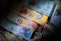 Ringgit rebounds to close higher on better-than-expected 2Q GDP forecast