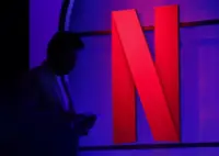 Netflix shares fall as weak dollar-driven forecast fails to impress