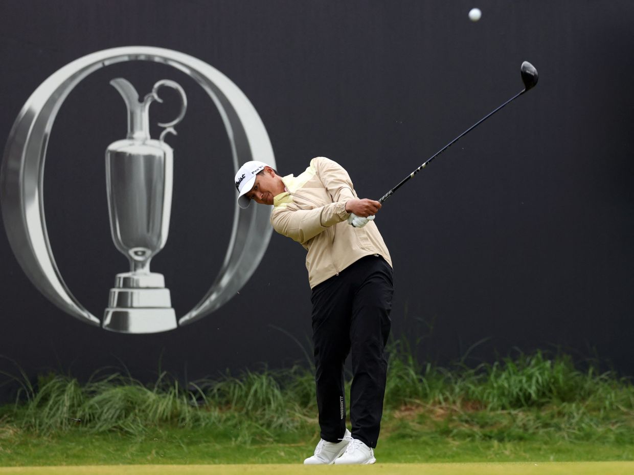 Golf - The 153rd Open Championship - Royal Portrush Golf Club, Portrush, Northern Ireland, Britain - July 18, 2025; Thailand's Sadom Kaewkanjana hits his tee shot on the 1st hole during the second round. -- Photo: REUTERS/Paul Childs