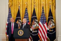 Trump signs stablecoin law as crypto industry aims for mainstream adoption