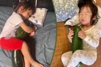 Quirky China trend shows kids, pets hugging giant winter melons to stay cool at night