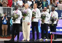 Athletics-British men collect world relay golds 28 years late