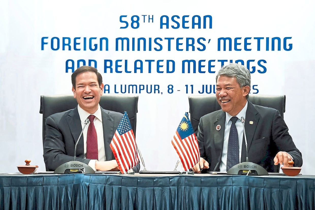 The writer says Rubio (left) came off as a much friendlier person as seen in this picture with Foreign Minister Datuk Seri Mohamad Hasan, feeling at ease taking impromptu questions from the media during the 58th ASEAN Foreign ministers meeting. — Photo courtesy of Mohamad Hasan's Facebook page