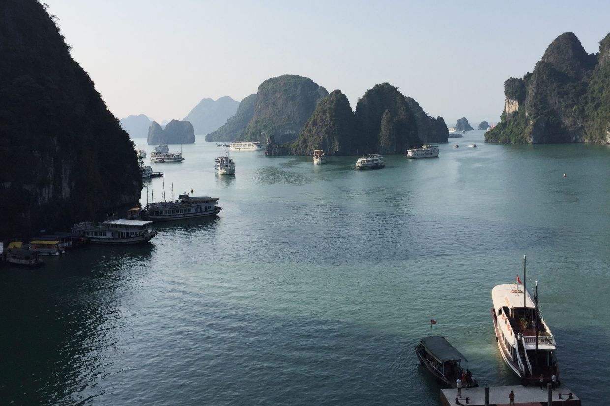- FILE photo. Tourist boats move in Ha Long Bay in Vietnam on Oct 24, 2015. - Photo: AP file