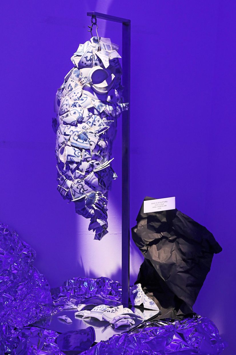'Wave 8' (2024), an installation by Chang, crafted from Wanli shipwreck porcelain fragments and organic cement. Photo: The Star/Yap Chee Hong