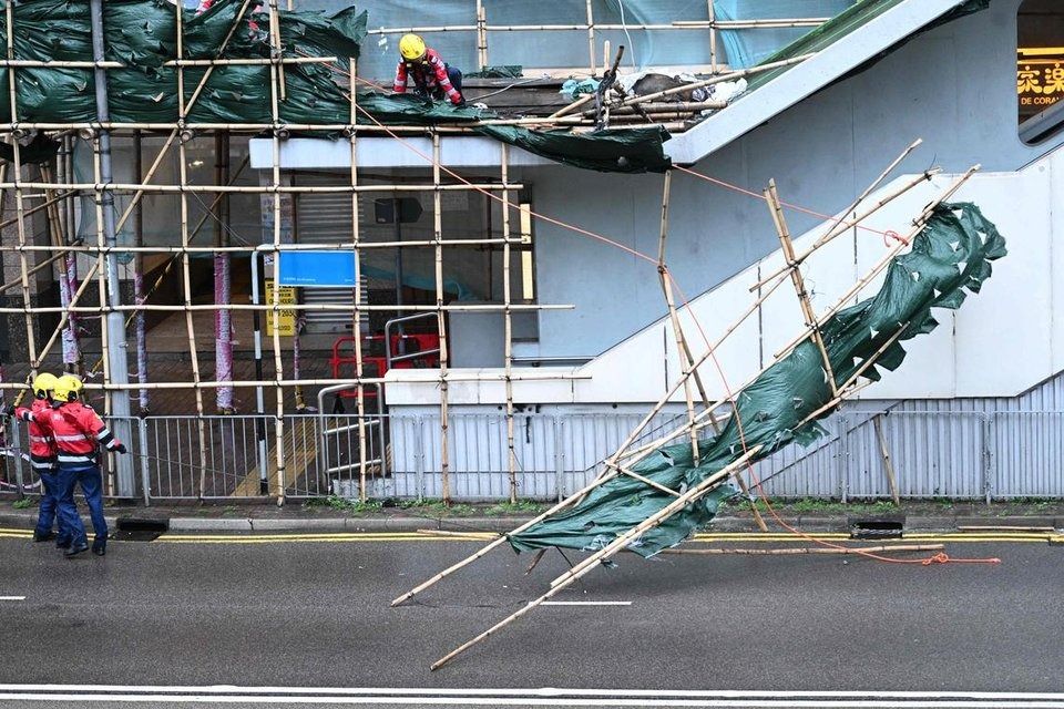 Just after 4pm on Sunday (July 20), weather authorities lowered the typhoon signal in Hong Kong to 8 from the maximum of 10. -- PHOTO: AFP