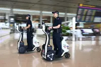Two-in-one Singapore airport police robot on trial can patrol and serve as PMD with ride-hailing feature