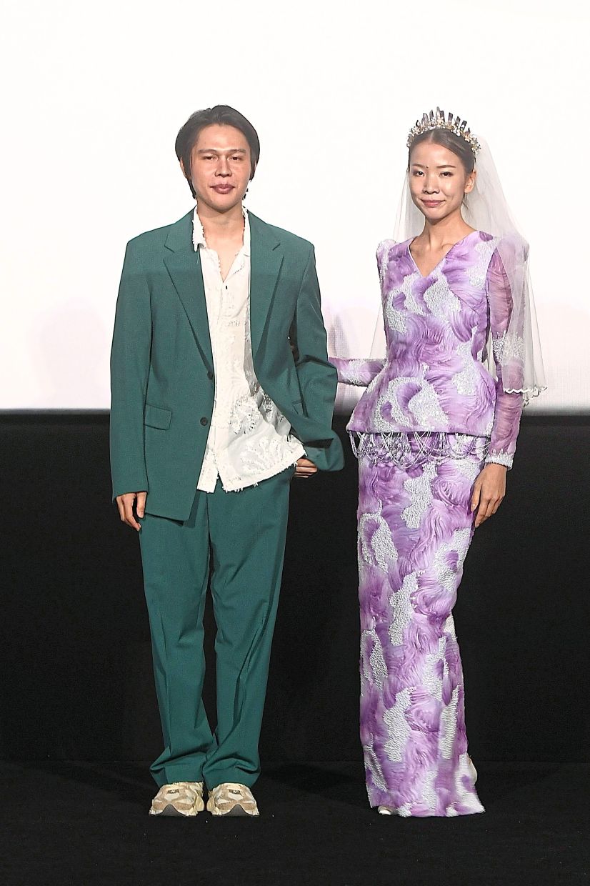 Designer Asyraf Ariff (left) is inspired by Malay fashion.